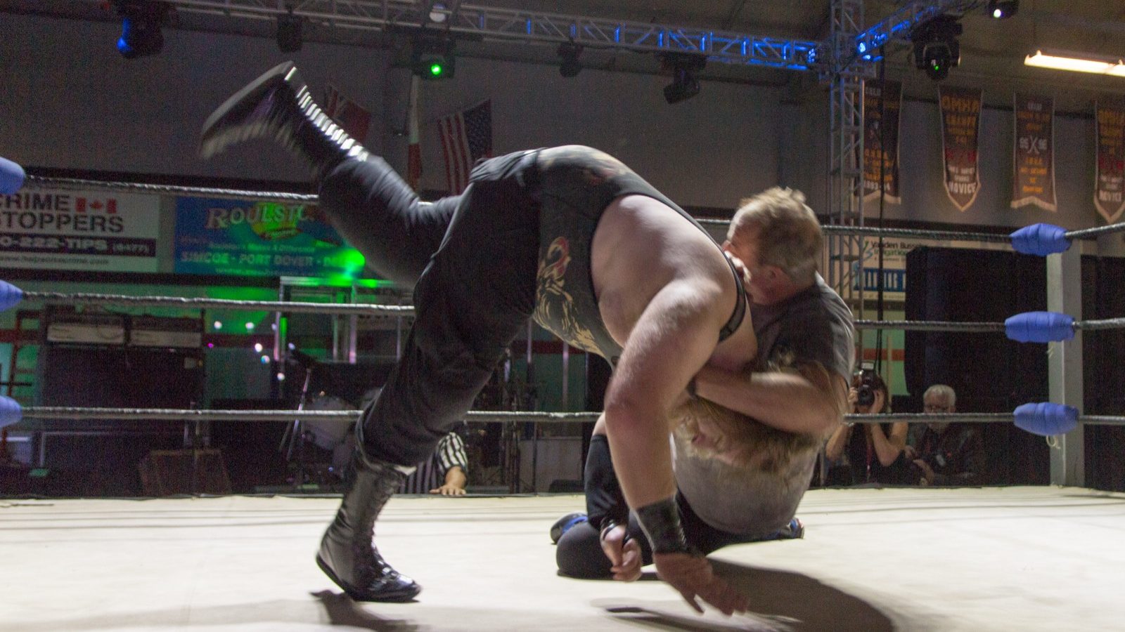 Jake "The Snake" Roberts hits a DDT on John Greed at a CWI show in Delhi, Ontario, in 2013