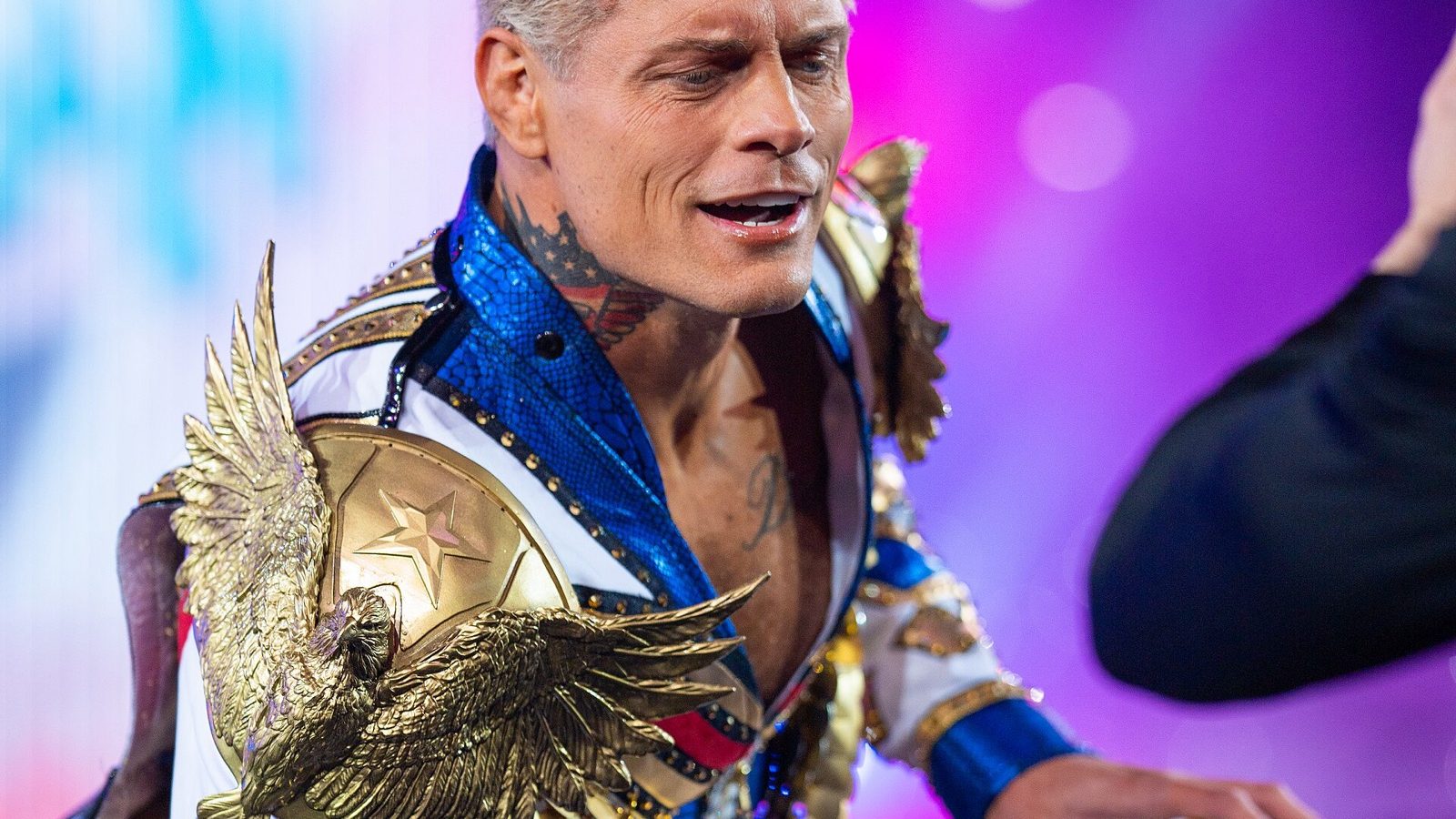 Cody Rhodes kneeling in his ring gear during his entrance at WrestleMania XL, April 2024