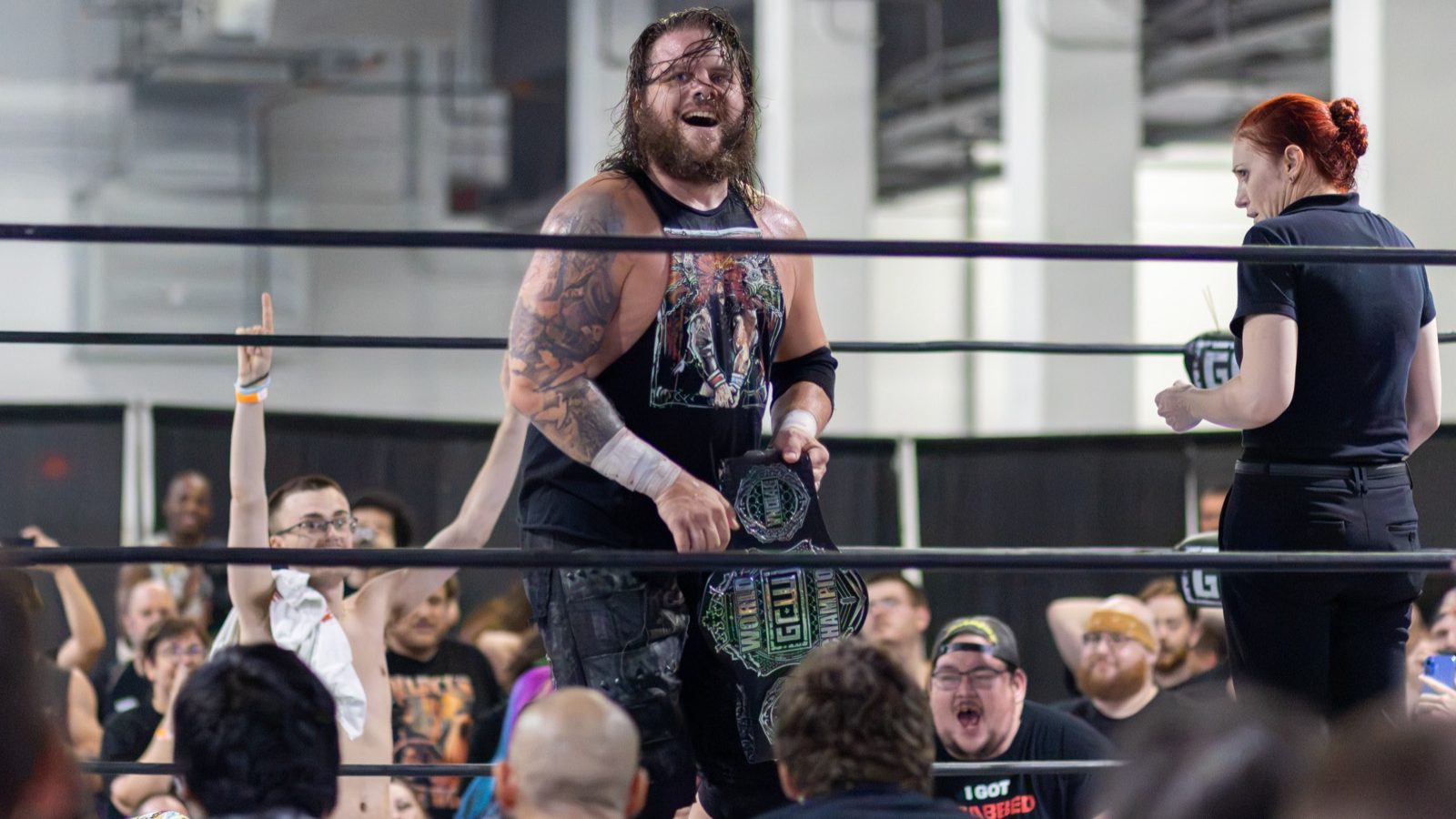 Joseph Sawyer, formerly Joe Gacy, holding the GCW World Championship belt in the ring at GCW Homecoming 2026 Night 1