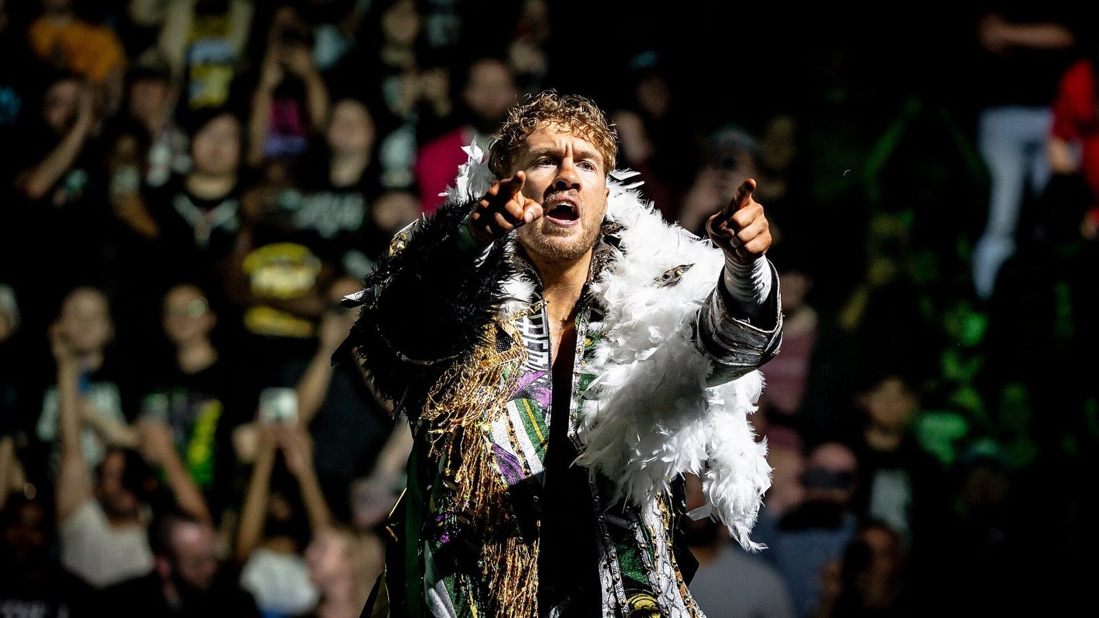 Will Ospreay pointing at the crowd during his entrance at AEW Revolution 2024